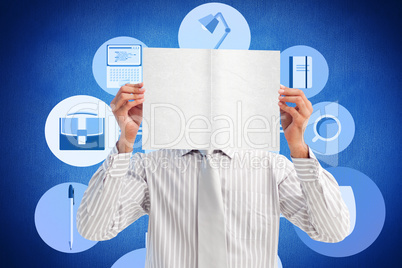 Composite image of businessman holding a white card covering his