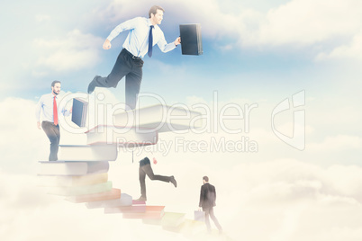 Composite image of businessman walking while holding briefcase