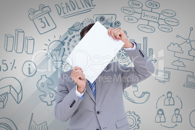 Composite image of businessman holding blank sign in front of hi