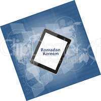tablet pc with ramadan kareem word on it