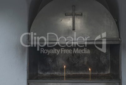 Burning candles in a church