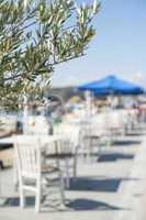 Typical greek restaurant and boat