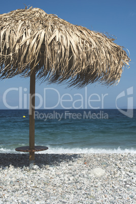 Straw umbrellas on the beach