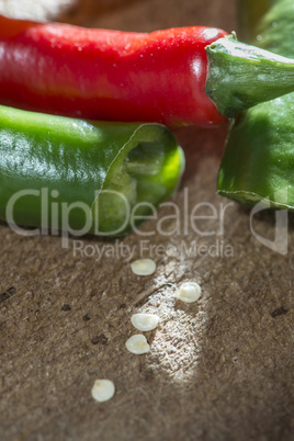 Hot peppers on wooden cutting board
