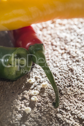 Hot peppers on wooden cutting board