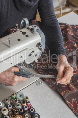 Woman and sewing machine