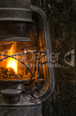 Old gas lantern on wood