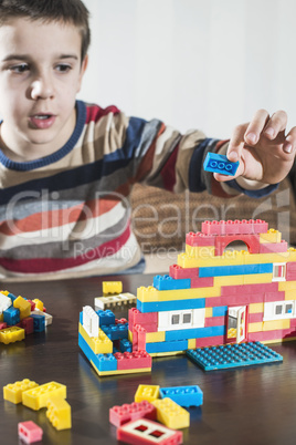 Child play with children's constructor toys