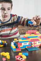 Child play with children's constructor toys