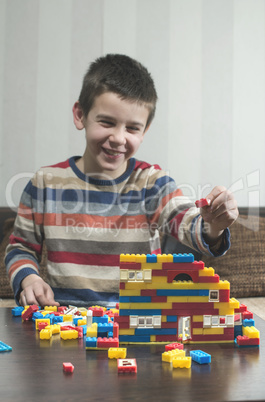Child play with children's constructor toys