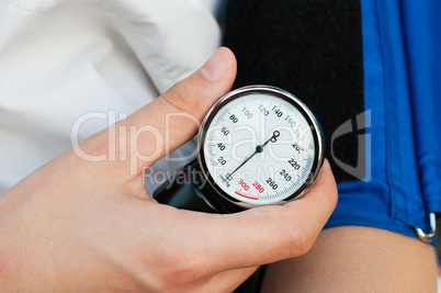 Blood Pressure Gage In a Doctor's Hands