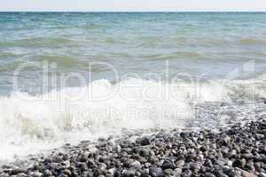 Baltic sea on a coast with pebble stones