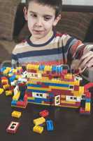 Child play with children's constructor toys