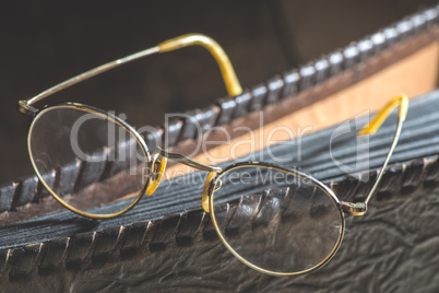 Old vintage glasses and photo album