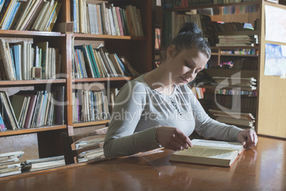 Young women in a vintage library