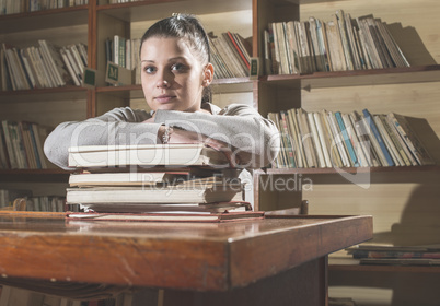 Young women in a vintage library