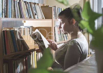 Young women in a vintage library