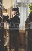 Young women in a vintage library