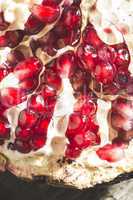 Pomegranate on wooden table