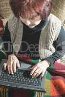 Old women using laptop