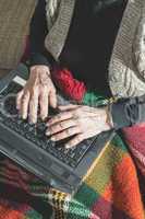 Old women using laptop