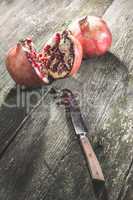 Pomegranate on wooden table