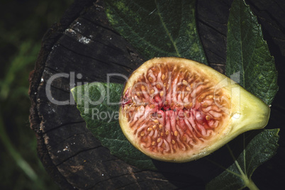 Figs and leaves on wood