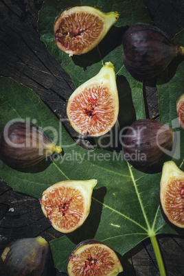 Figs and leaves on wood