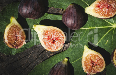Figs and leaves on wood