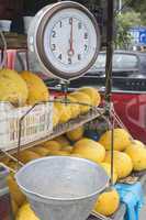 Selling melons on the market