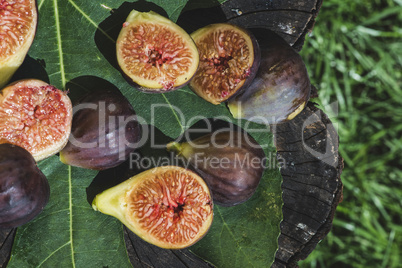 Figs and leaves on wood