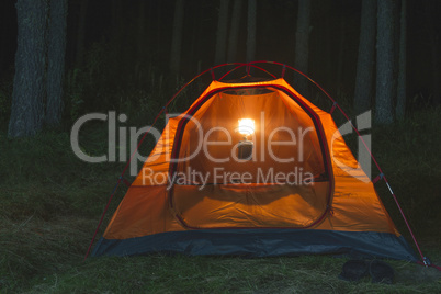 Tent in the forest at night