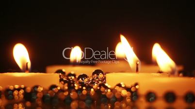 burning candles close-up seamless loop