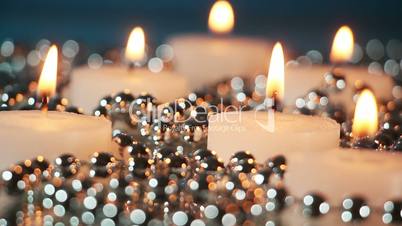 burning candles and christmas beads loopable