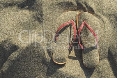 Sandals on the beach in the sand