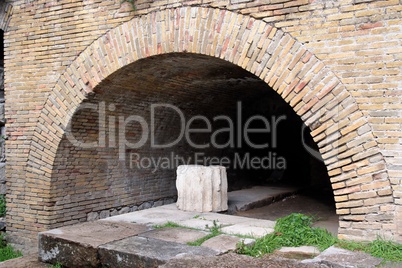 Ancient brick arch at small Roman theater in Taormina, Sicily, Italy