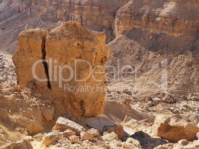Scenic cracked orange rock in stone desert, Israel