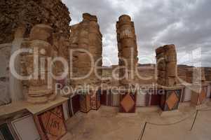 Fisheye view of colonnade of ancient Masada palace of King Herod on cloudy day