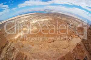 Fisheye view of desert landscape near the Dead Sea seen from Masada fortress