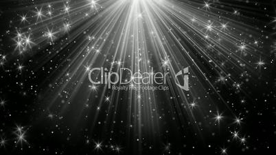 light rays and stars on black loopable background