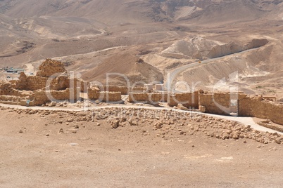 Ruins of ancient Masada fortress in the desert in Israel