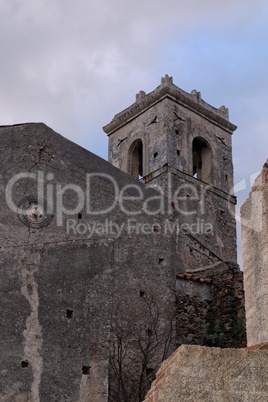 Old church belfry in Savoca village, Sicily, Italy in the evening