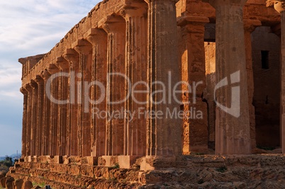 Colonnade of ancient Concordia temple in Agrigento, Sicily, Italy  at sunset