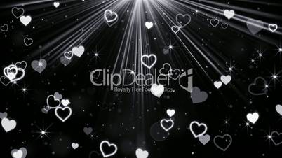hearts and stars flying in light rays loop