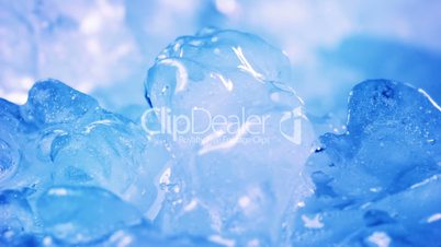 thawing blue ice close-up timelapse
