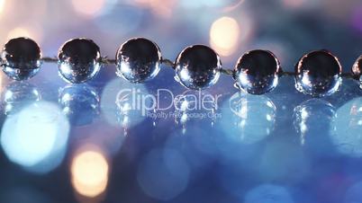 christmas beads decoration on glass close-up panning