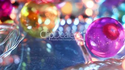 blinking lightbulbs and christmas balls close-up