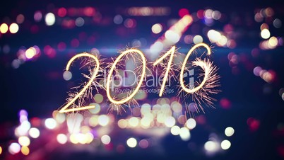 2016 new year sparkler text and city bokeh lights