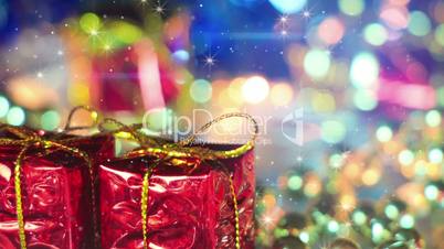 christmas gift boxes and shimmering particles loopable