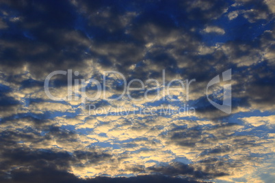 summer sunset with blue sky and sun